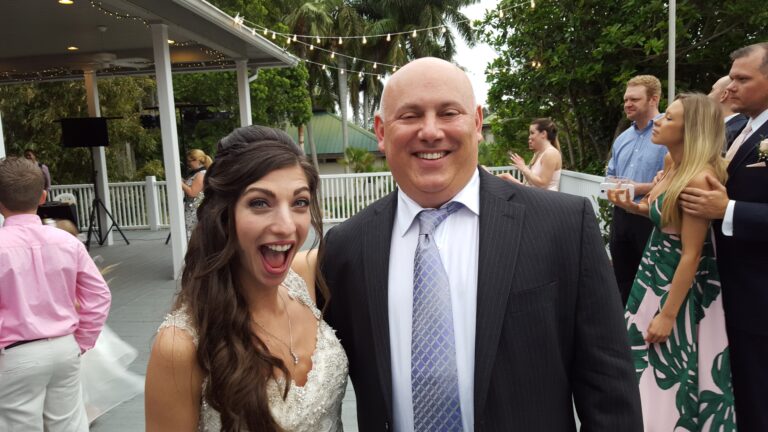 Sarasota Wedding Photographer | David with one of his happy brides!